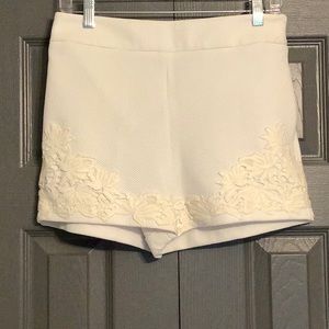 Express off white embroidery style shorts